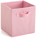 Pink fabric cube drawer with front handle and open top interior