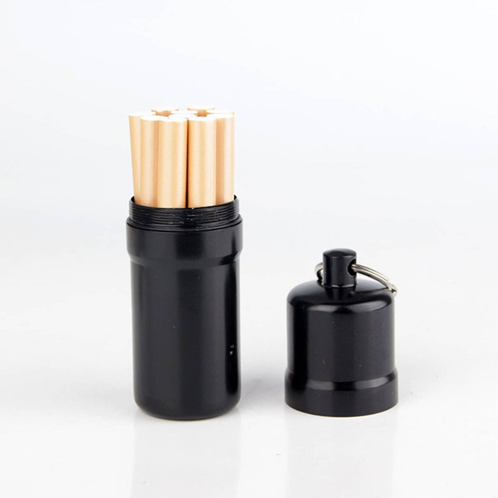 Black round cigarette case with hinged top holding cigarettes and nearby key ring case