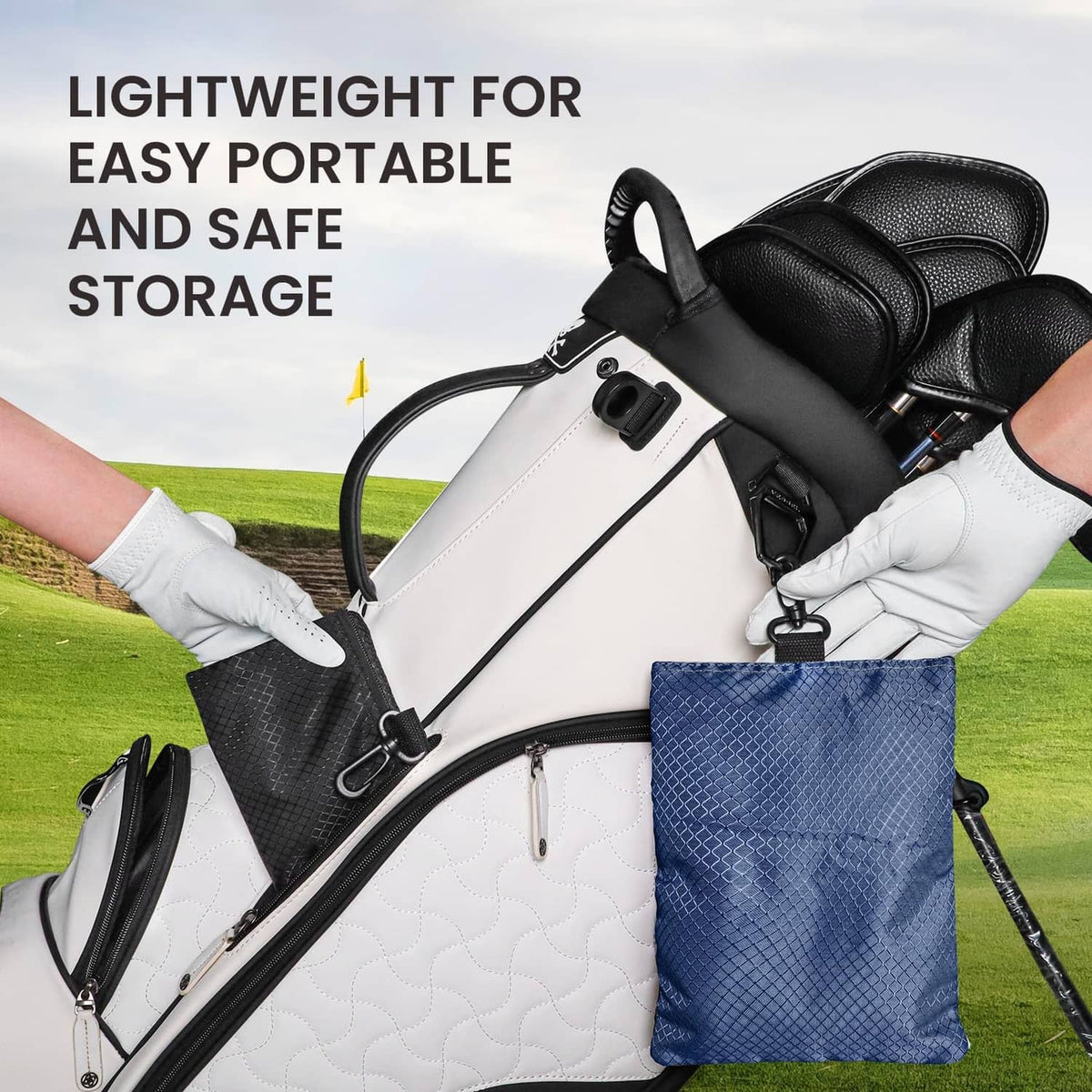 Blue golf pouch bag clipped to golf bag with strong plastic hook and hanging loop