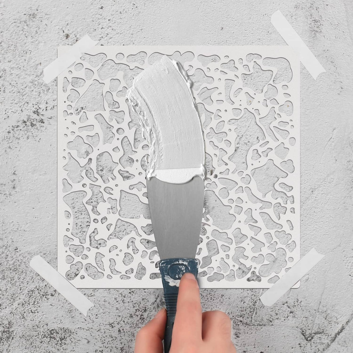Knockdown texture drywall repair sheet with trowel coating, close-up view