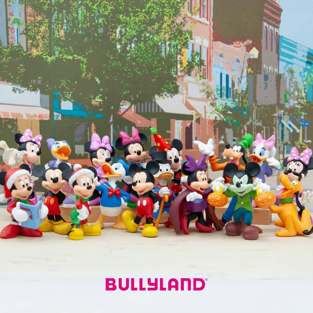 Group of colorful character figurines, including a duck in a black top hat with cane