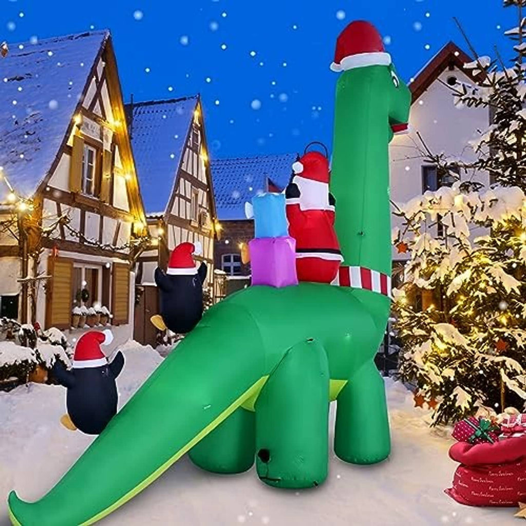 Green 13ft inflatable dinosaur decoration with Santa, penguins, and gift boxes, outdoor