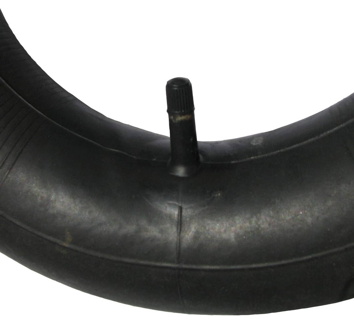 Close-up of black inner tube valve stem and tube seam line