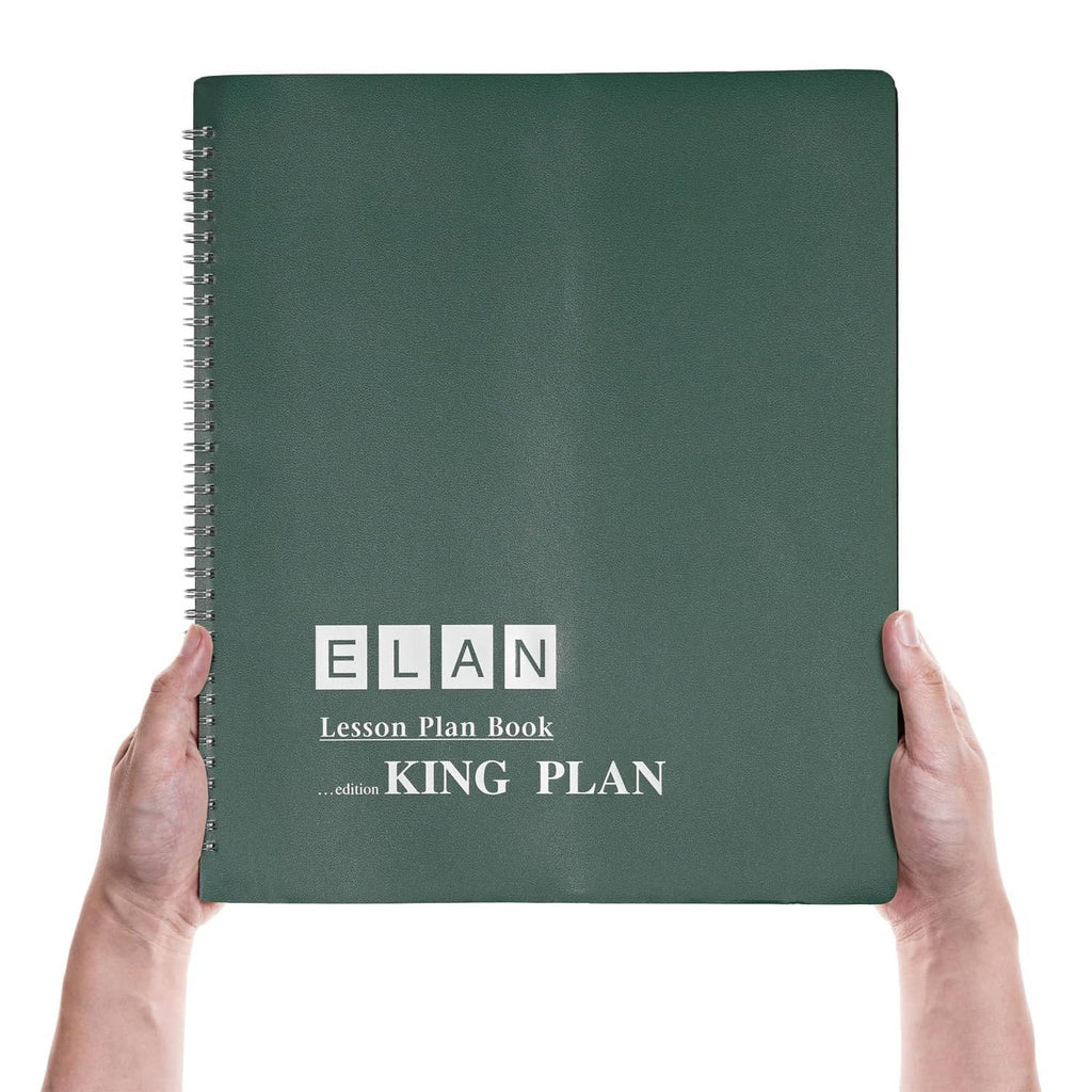 Dark green lesson plan book front cover with KING PLAN title, held by hands.
