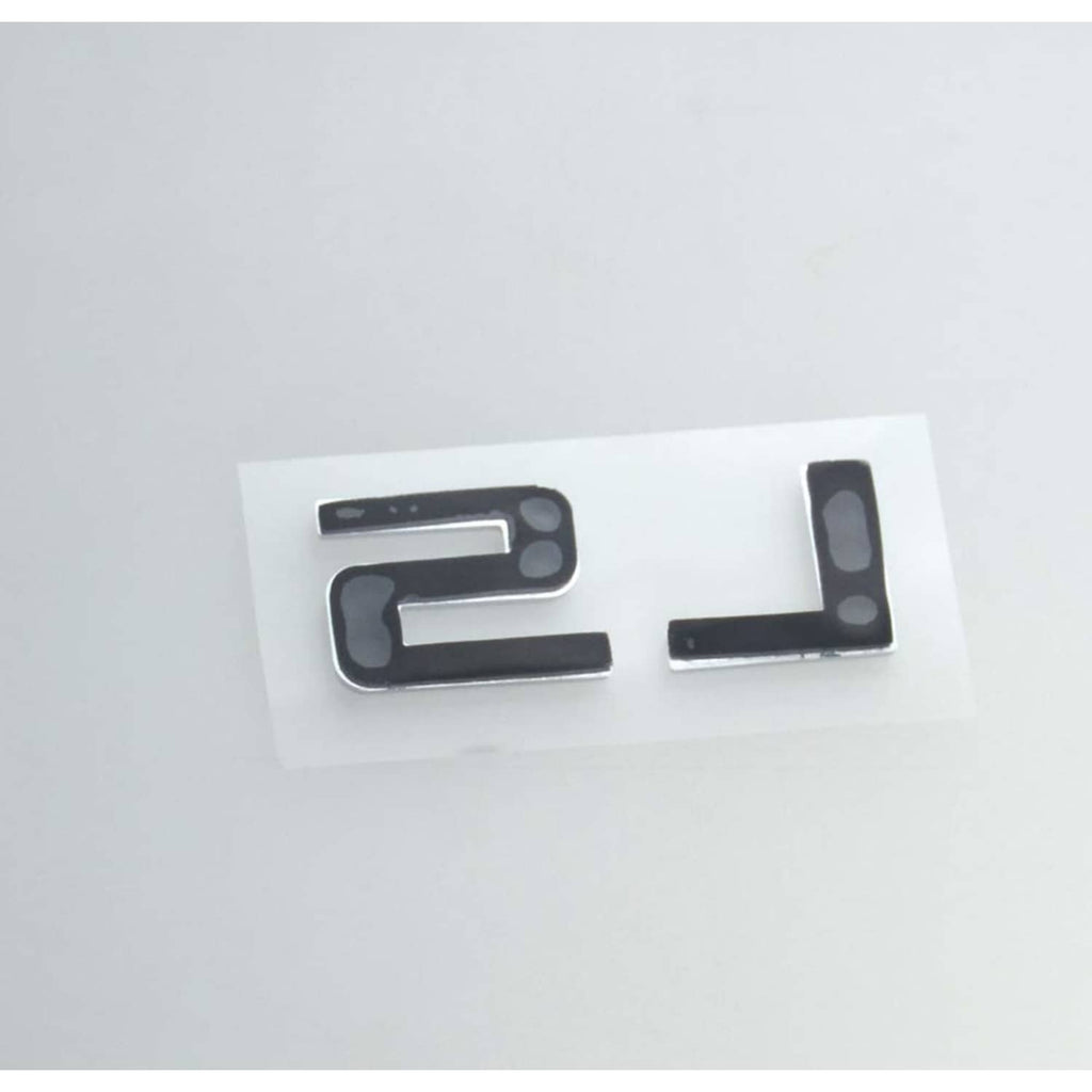 Gloss black LS emblem badges with chrome-edged backs on white backing.