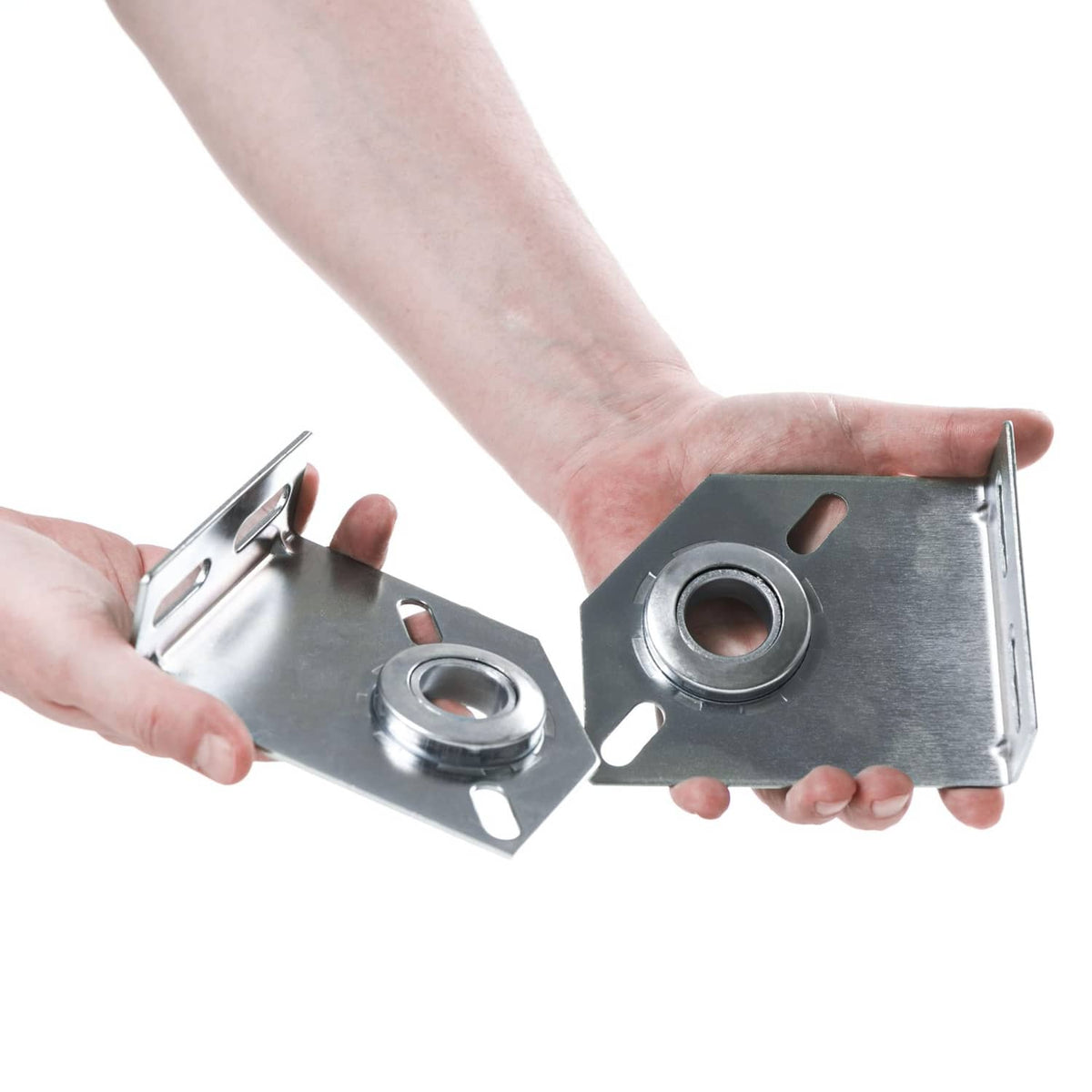 Hand installation of two silver garage door spring center bearing brackets with bearing cups