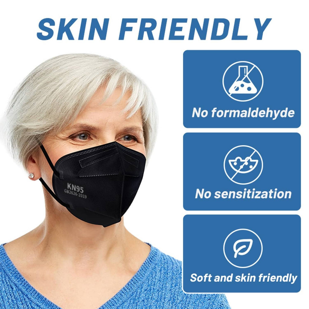 Black KN95 face mask on older woman with comfortable ear loops