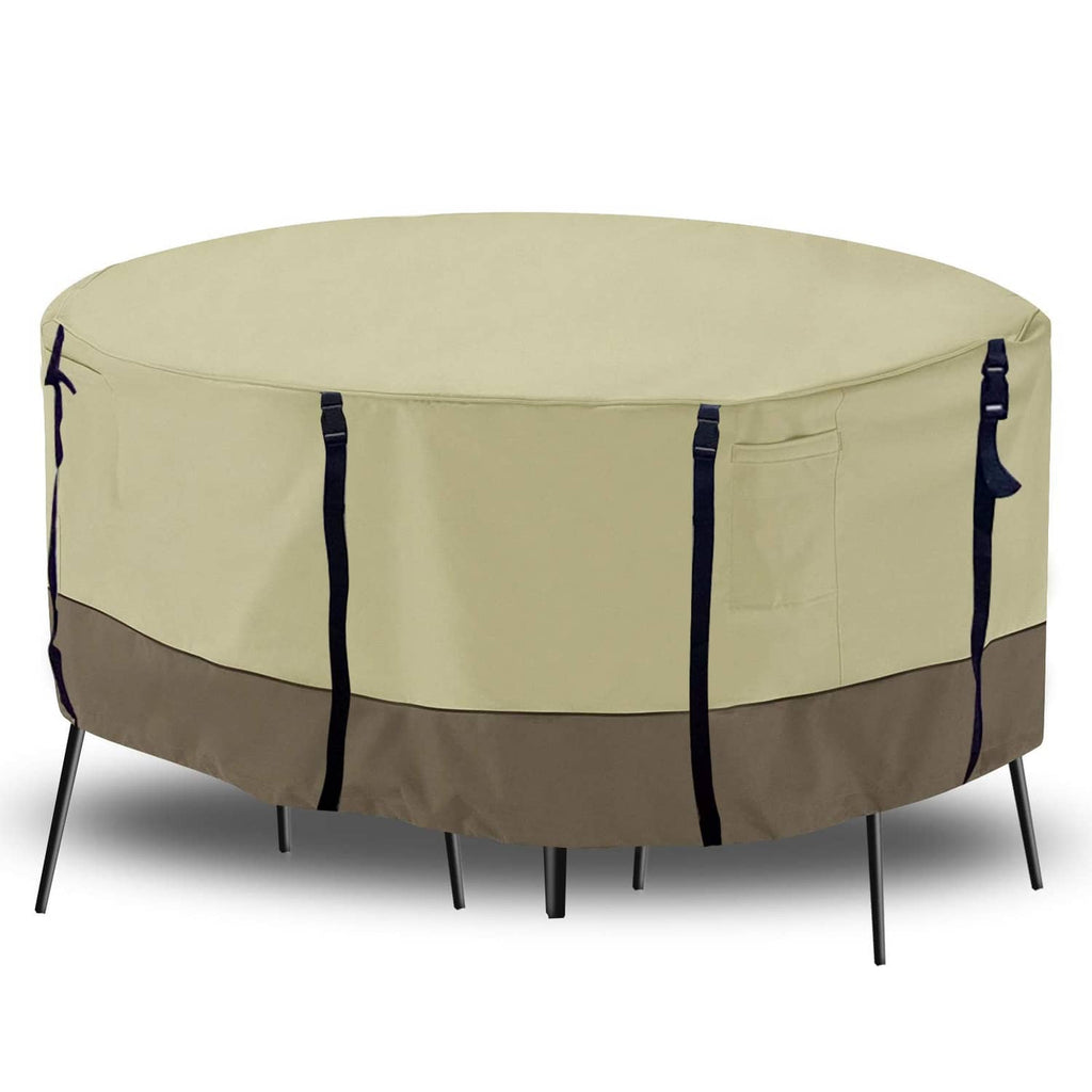 Beige round patio table cover with black trim and buckle-style securing straps
