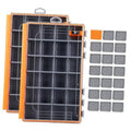 Orange fishing tackle box with gray divided waterproof trays, hinged lid open