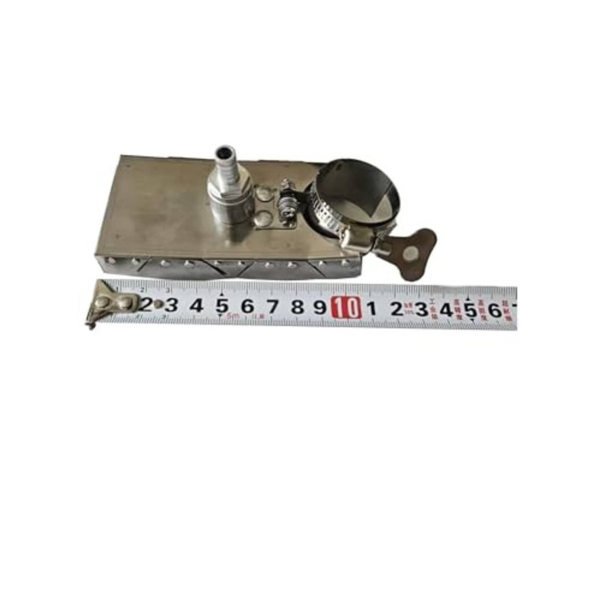 TIG welding trailing shield shown with ruler, cup and metal mounting handle