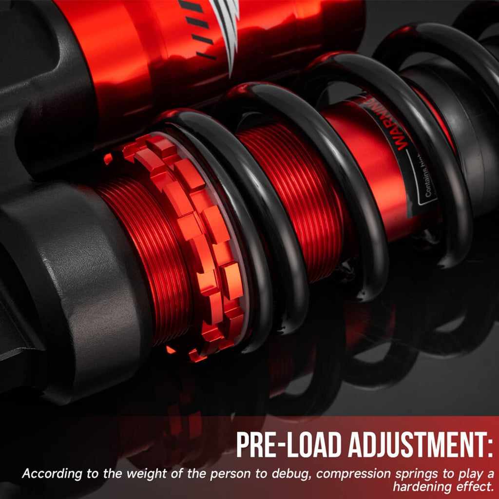 Rear air shock absorber spring and red reservoir detail with pre-load adjustment ring