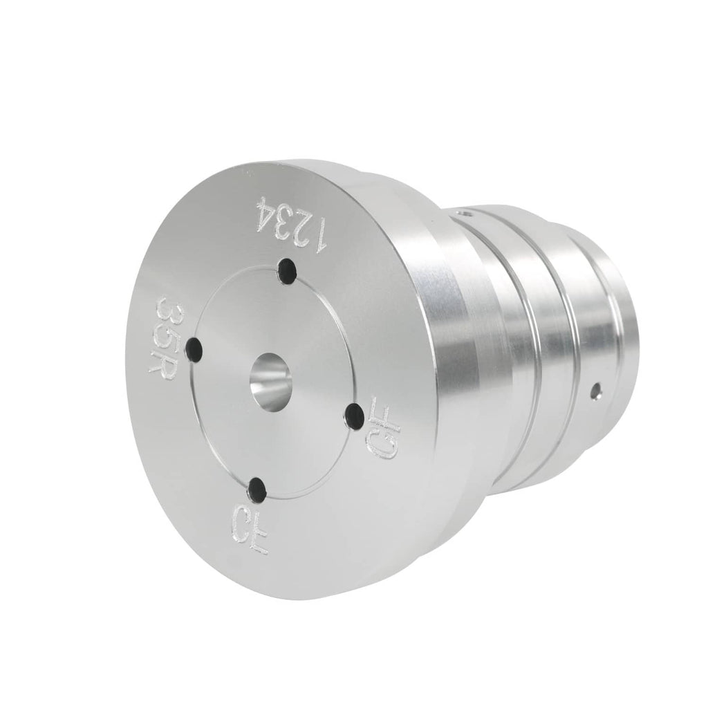 Metal drum tester flange plate with stud holes and engraved scale markings, angled view
