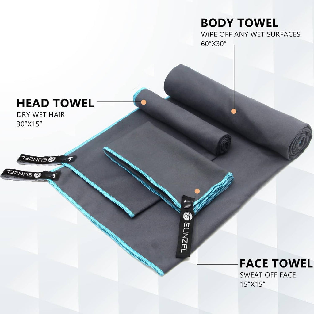 Rolled dark gray quick-dry towels with turquoise trim and hanging loop tags