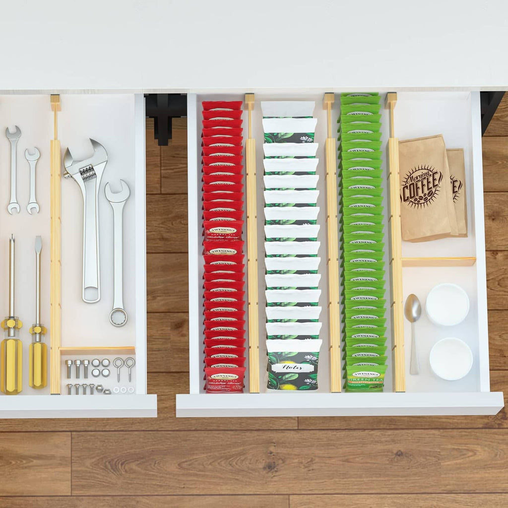 Bamboo drawer divider inserts creating divided sections in a drawer organizer system