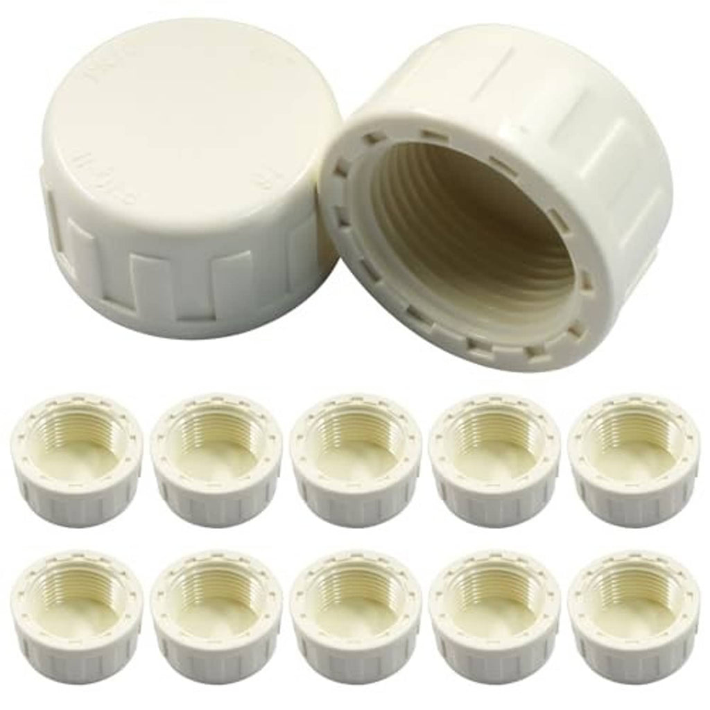 Set of white PVC female-thread end caps with visible internal threads and rounded tops