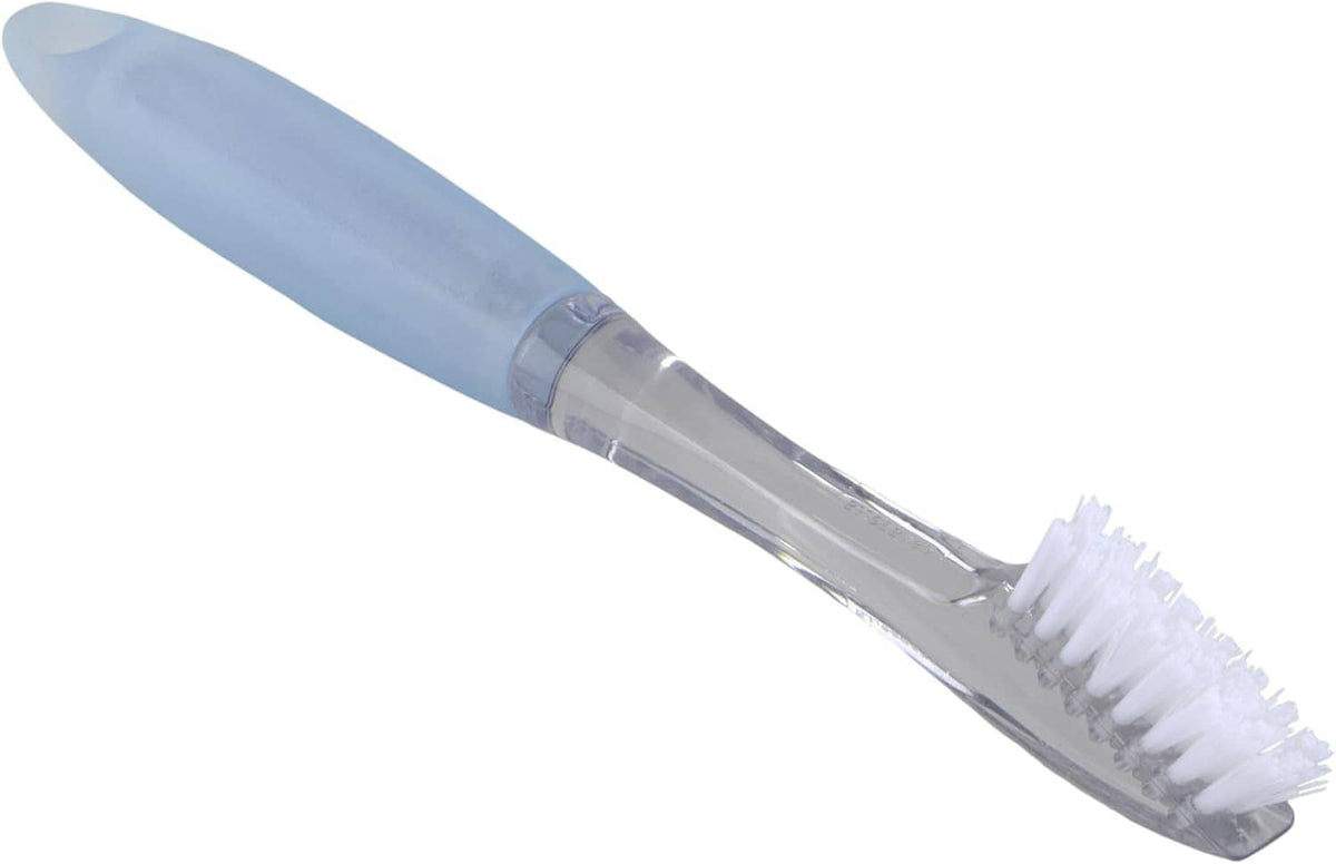 Clear grout brush head with white bristles on aqua handle, angled
