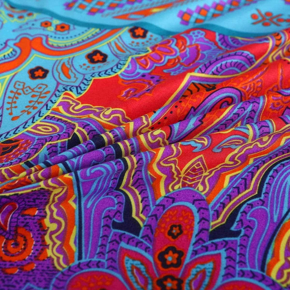 Close-up of vibrant boho paisley print with layered swirls and floral shapes