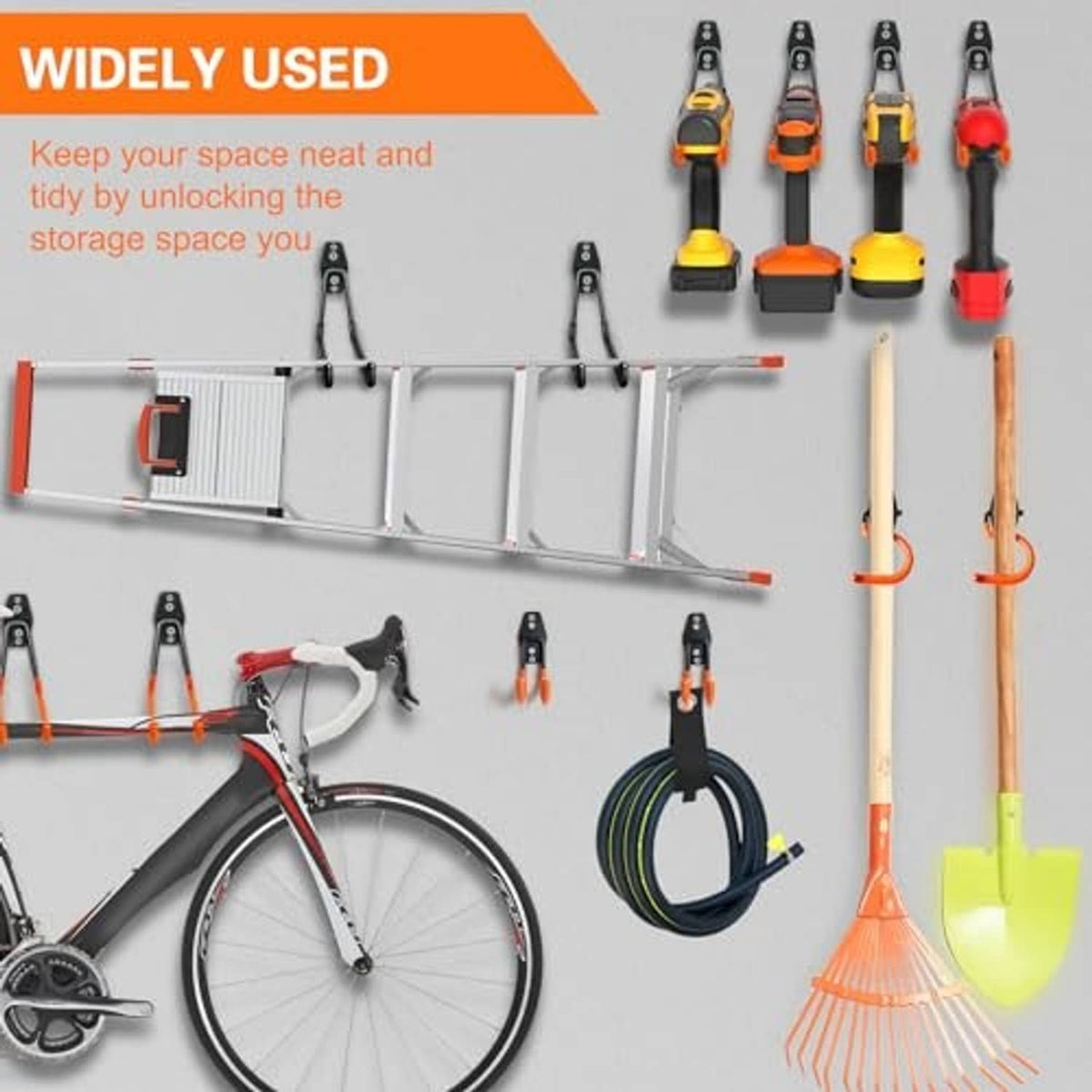 Black garage hooks on a bar, holding tools like bike and garden utensils