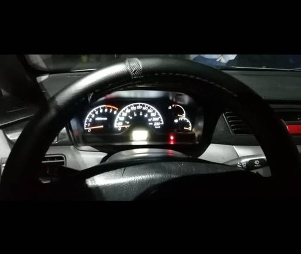 Vehicle instrument cluster lit with T5 LED bulbs for enhanced gauge visibility