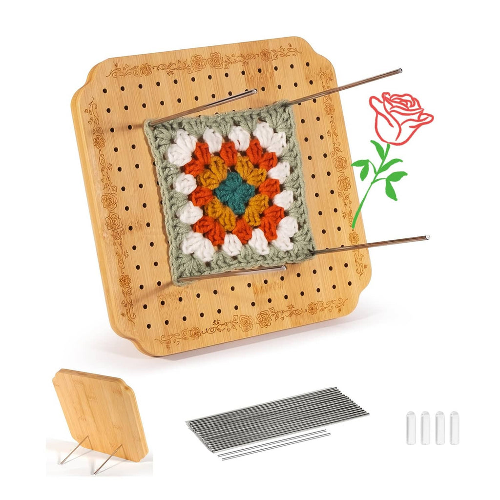 Light tan crochet blocking board with colorful crocheted square and metal pins