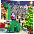 13ft green inflatable dinosaur decoration with Santa and penguin figures, outdoor-ready