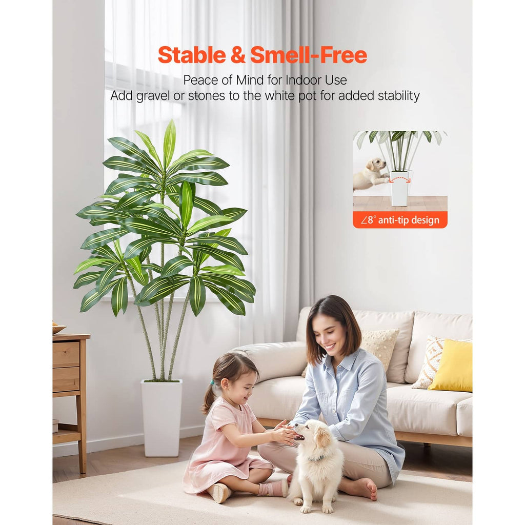Faux dracaena tree in white pot for indoor decor