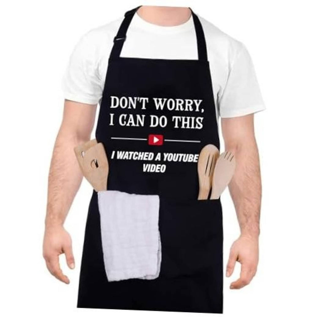 Black cooking apron with slogan, adjustable neck strap, and two front pockets