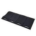 Black rubber tire wheel ramp pad with textured anti-slip surface and four side slots.
