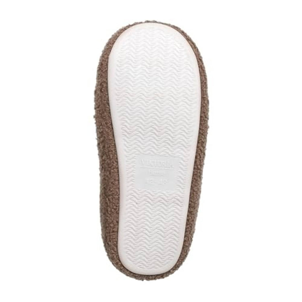Brown slipper showing white textured outsole underside