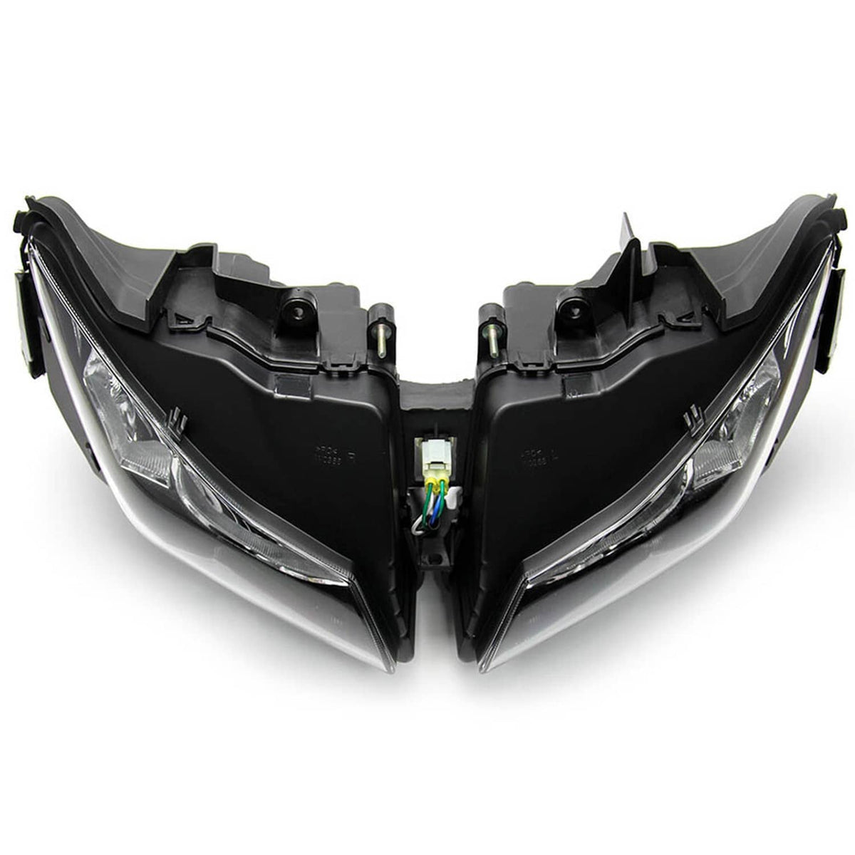 Front headlight assembly pair with clear lenses and black trim, wiring connector visible