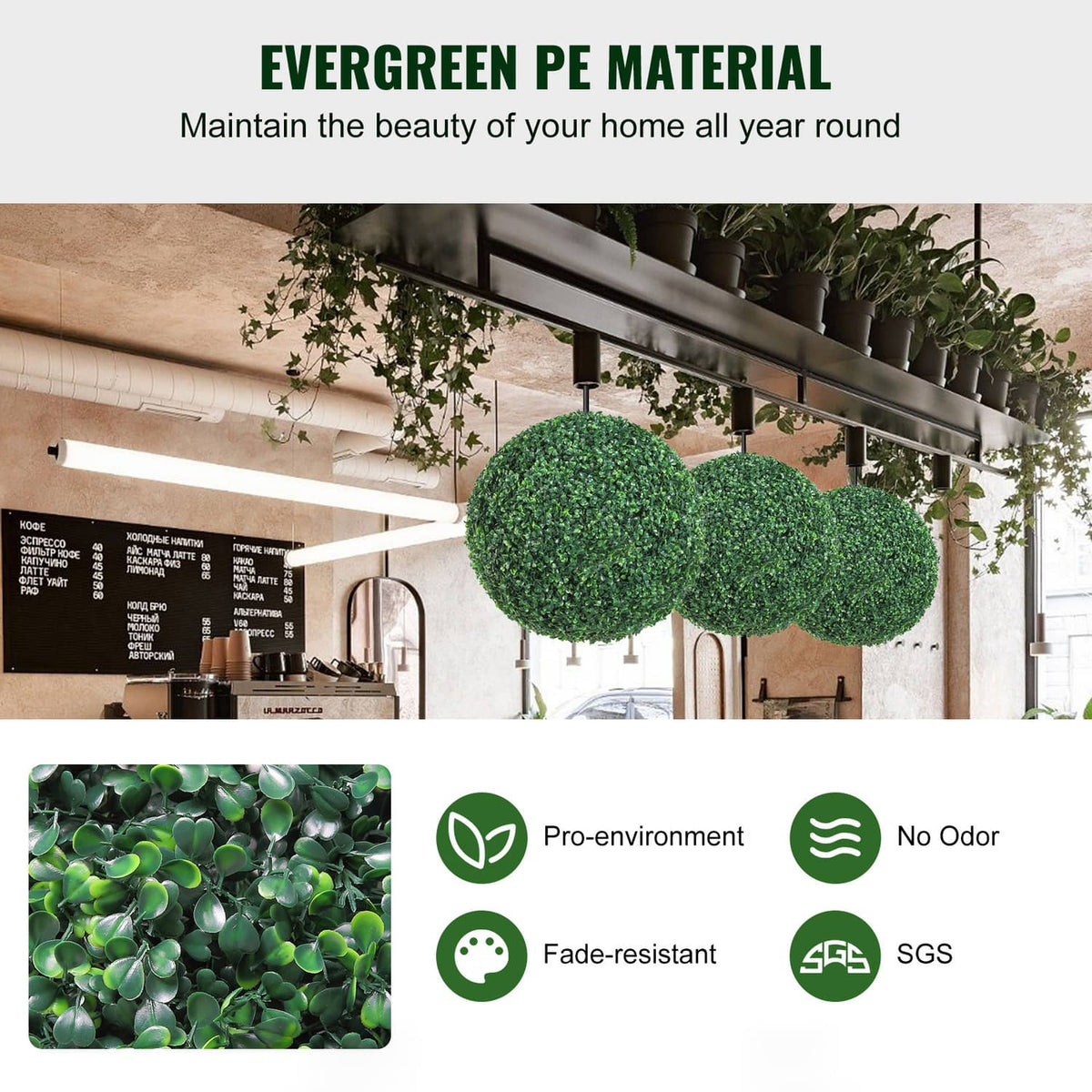 Artificial greenery topiary ball pair with dense leaf texture on shelf