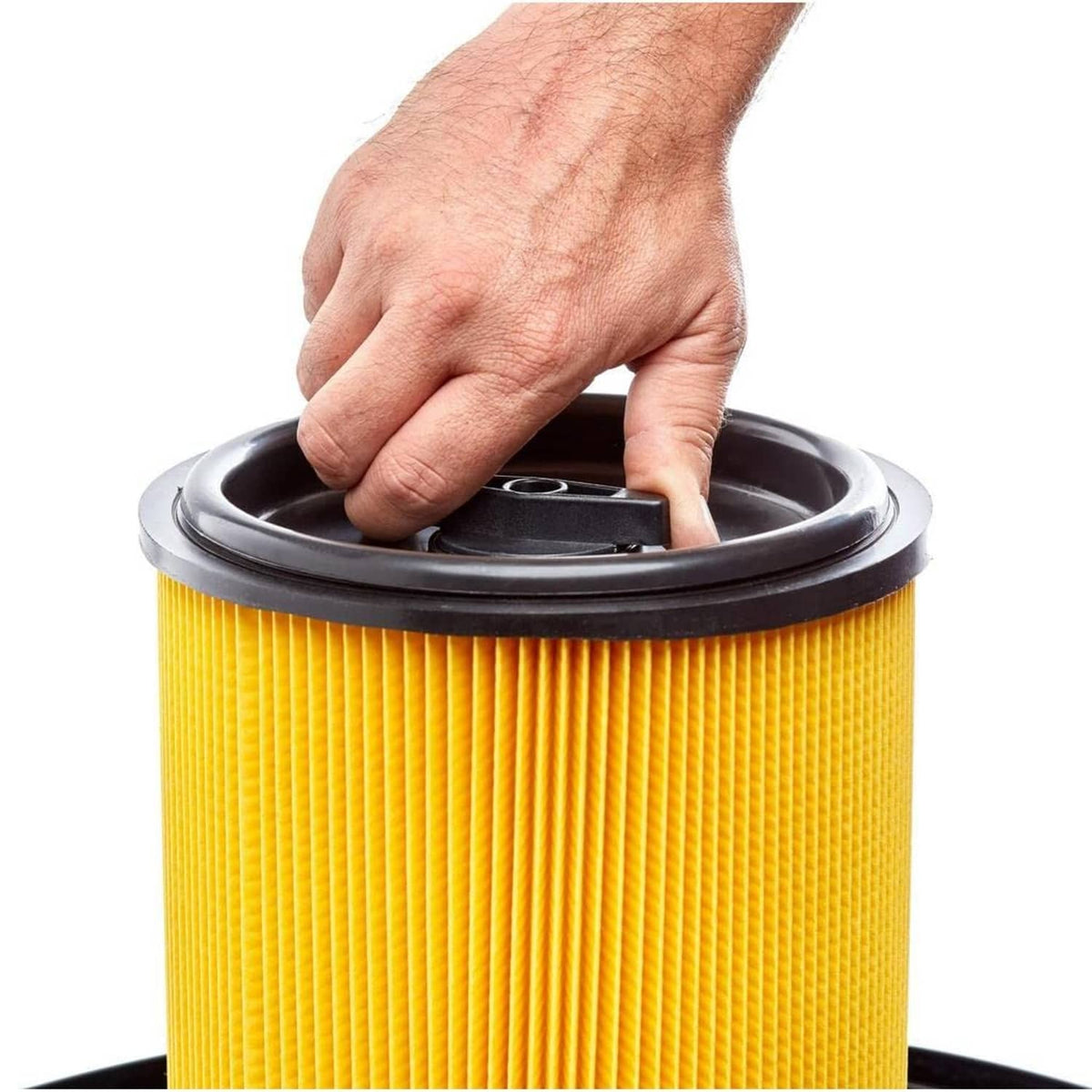 Yellow pleated filter with black top housing, close-up