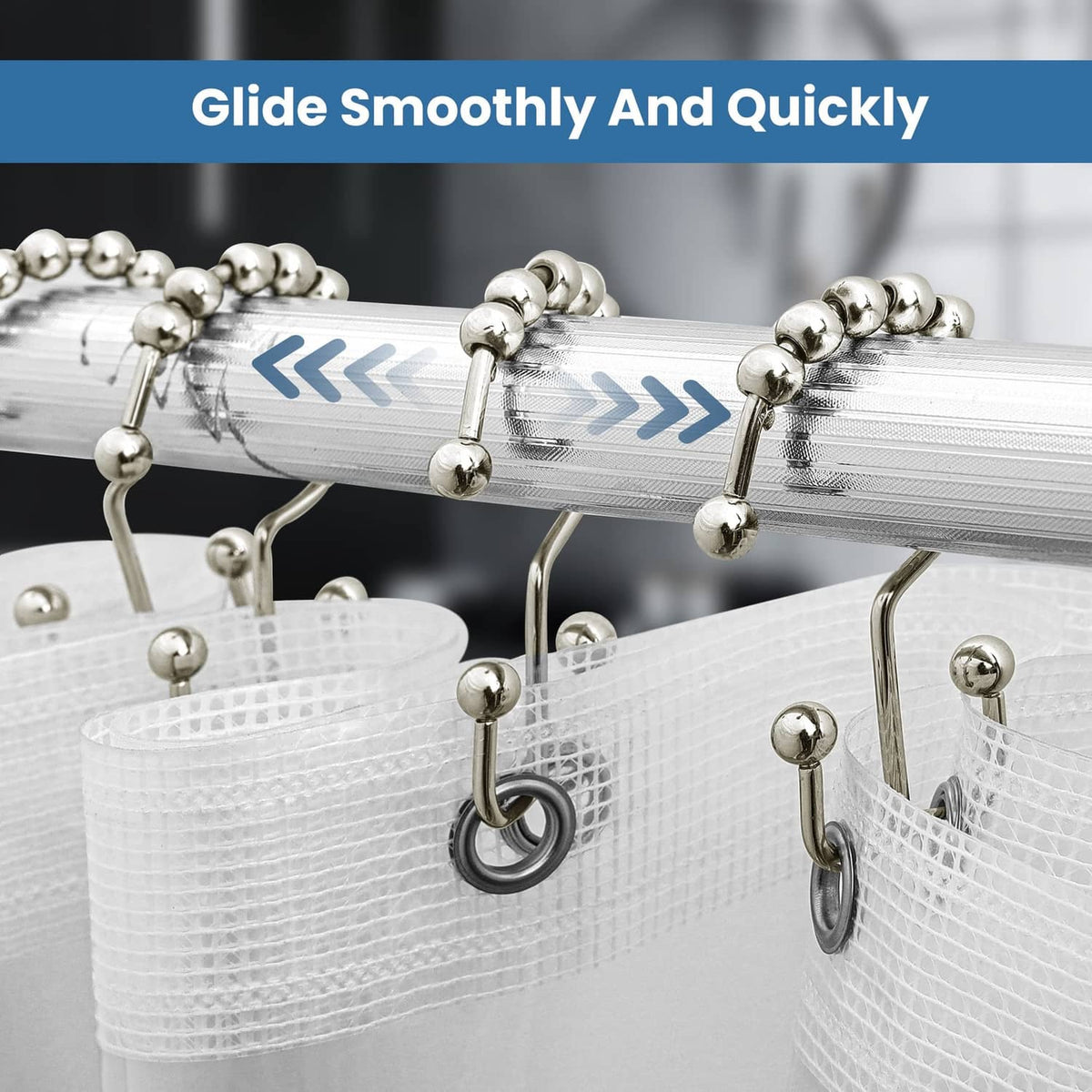 Nickel roller shower curtain hooks sliding along a bar under a shower liner