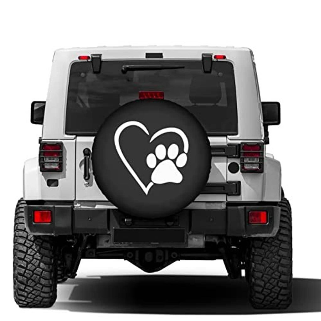 Spare tire cover installed on a white SUV rear, heart paw design