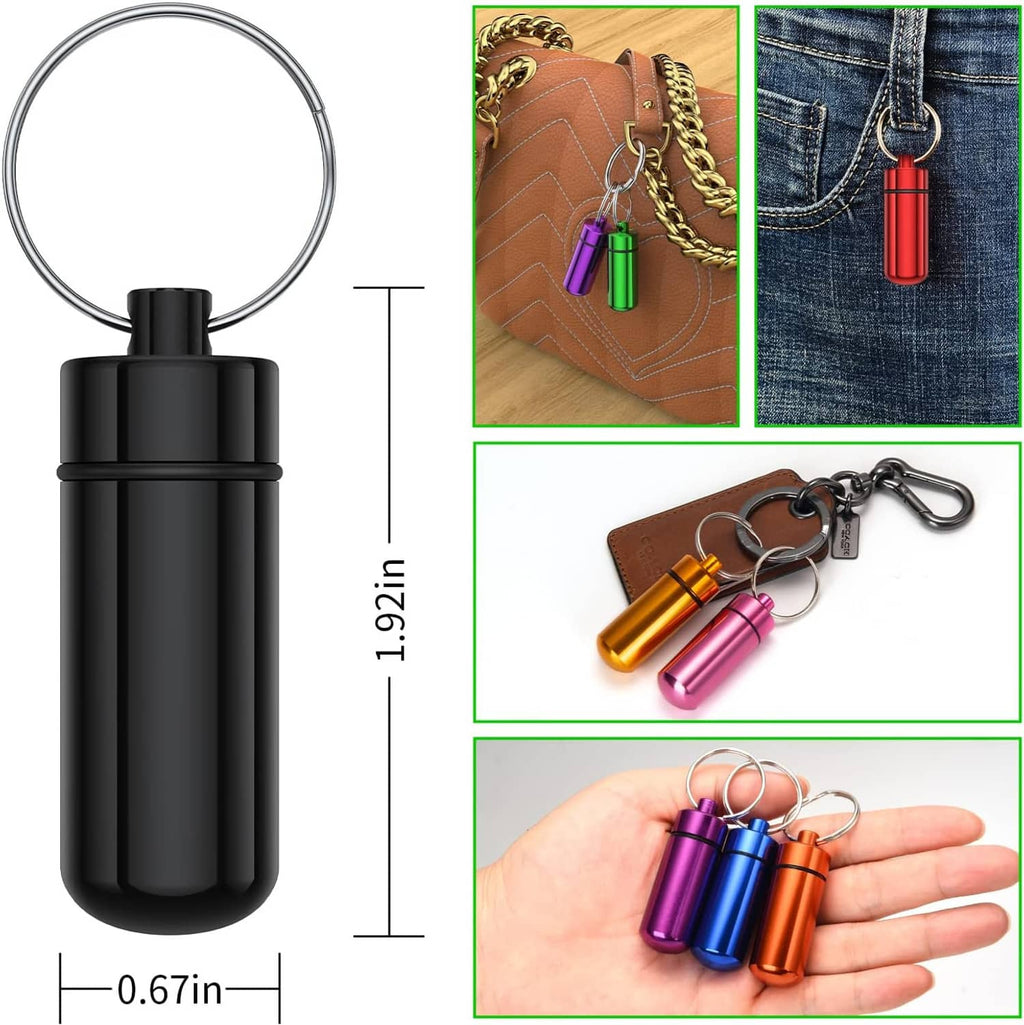 Black small pill case with keychain loop, compact size with lid and base detail.