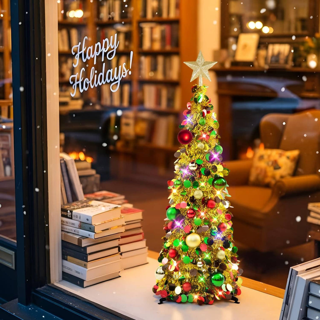 3ft gold pop-up Christmas tree with star topper, glowing multicolor LED lights and ornaments