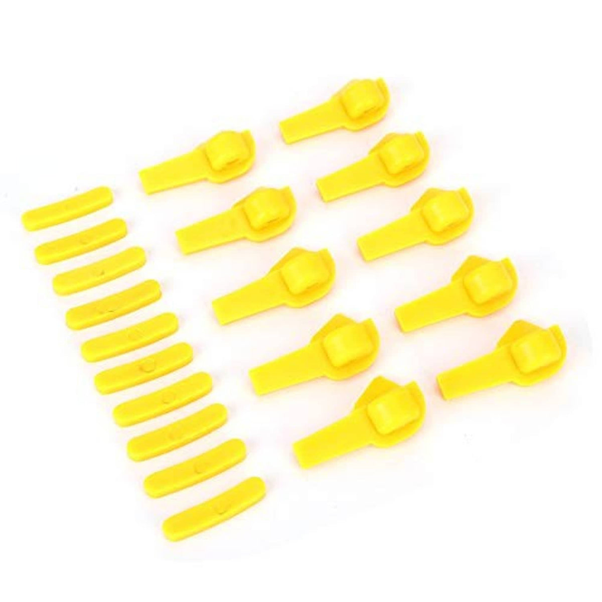 Yellow tire changer duck head inserts, showing multiple curved tabs and locking tips