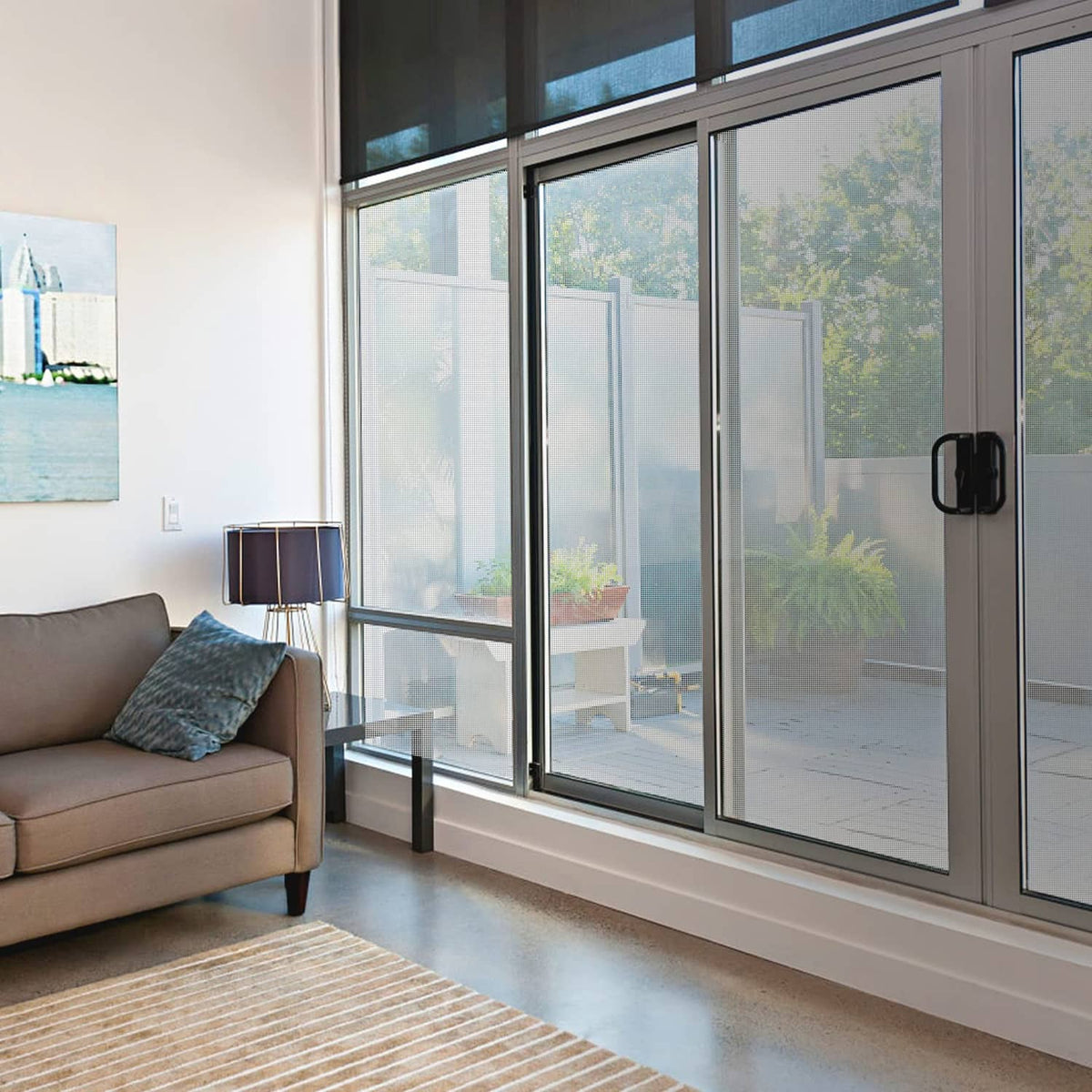 Window fitted with stainless steel mesh screen