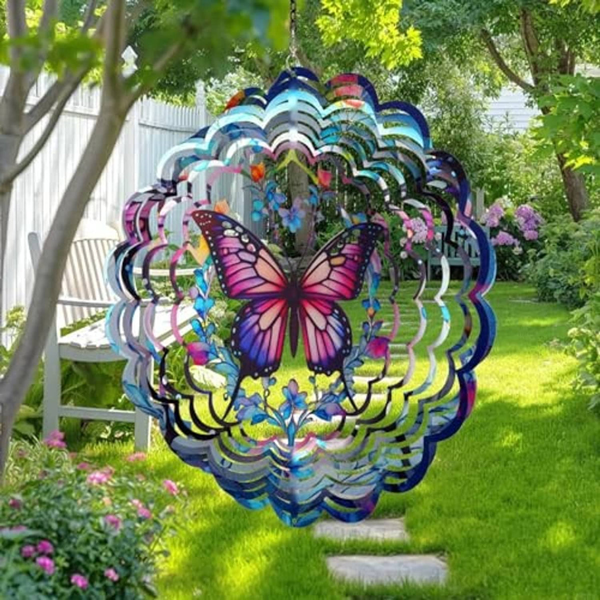 Butterfly wind spinner hanging in garden on a chain, multicolor reflective layers