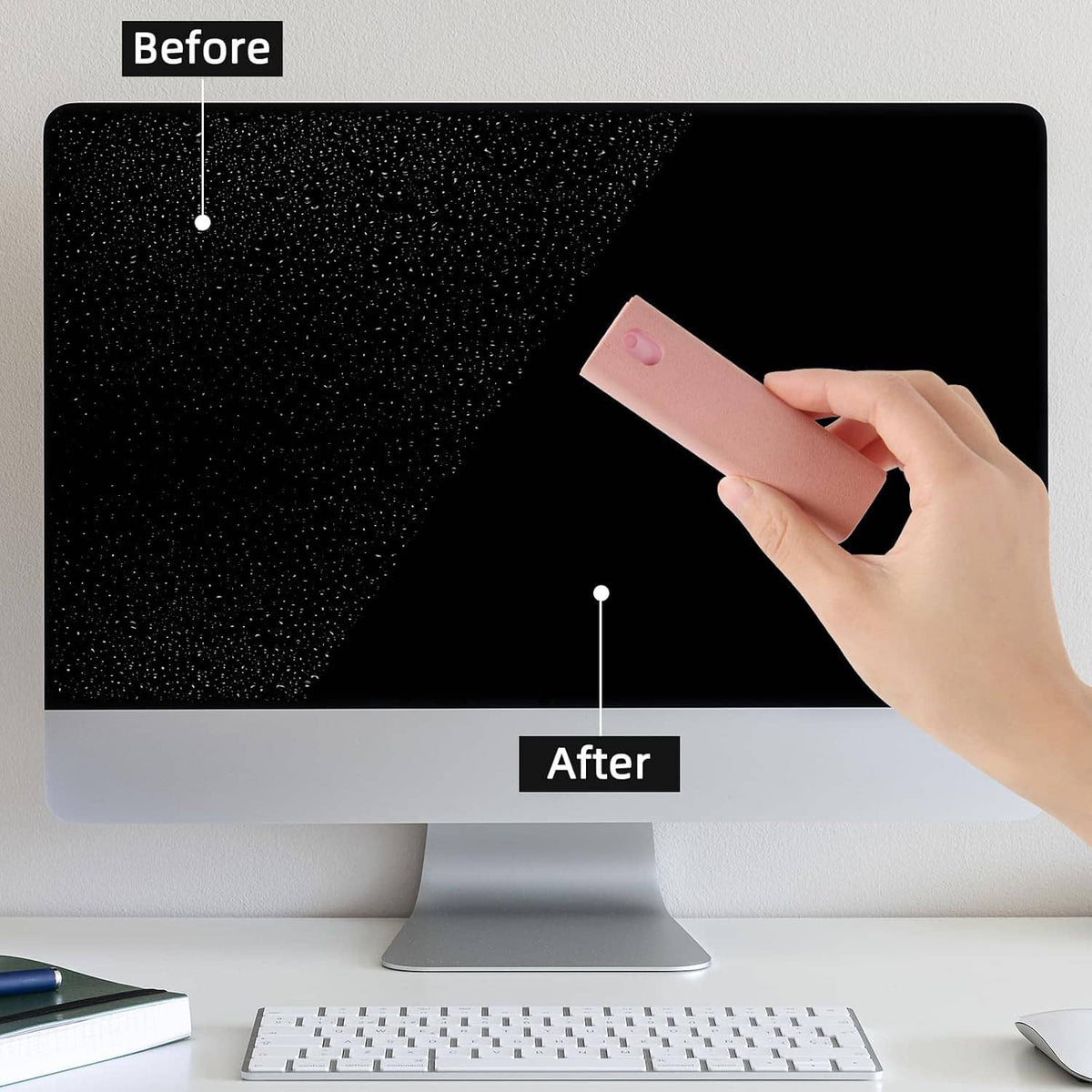 Microfiber screen cleaner wiping a computer monitor with dust specks on the screen