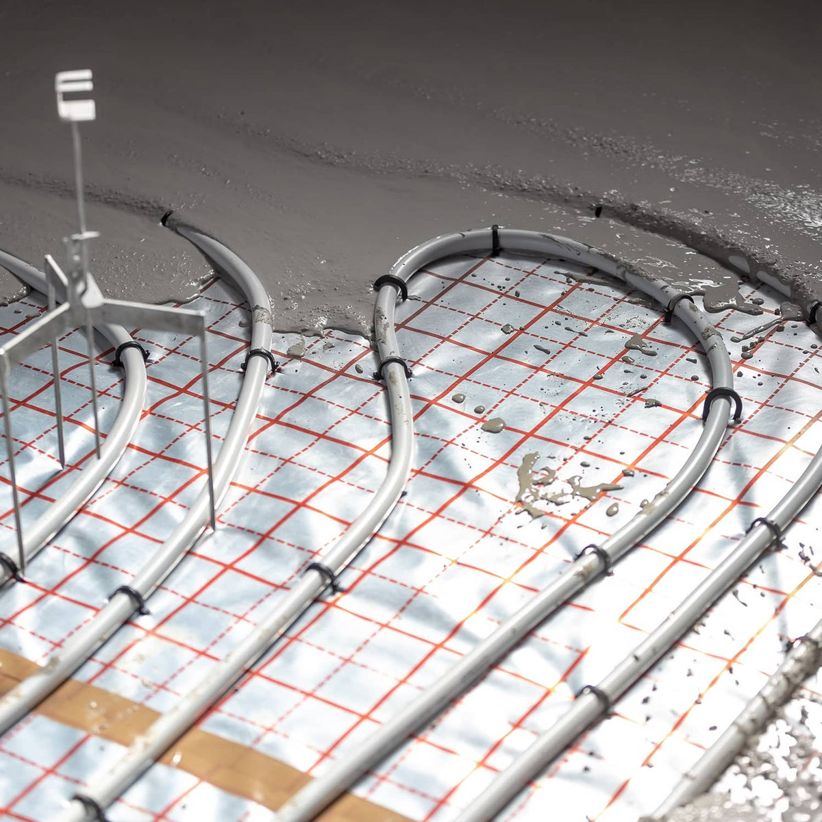 White 3/4 in PEX-B tubing bundle, neatly coiled pipe sections