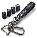 Black Mercedes valve stem caps and metal keychain with Mercedes-Benz logo and keyring