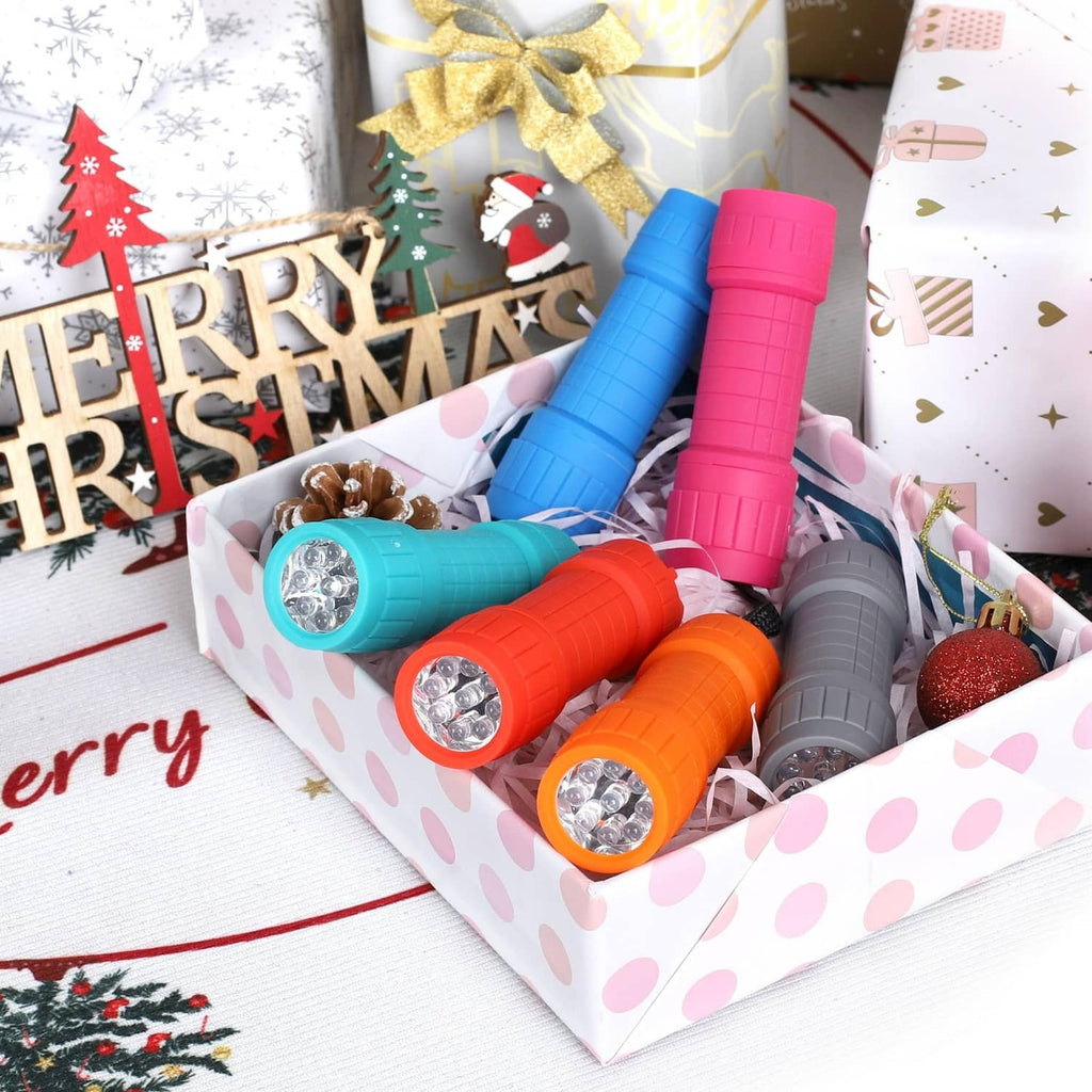 LED mini flashlights in blue, pink, gray, and orange inside a gift box