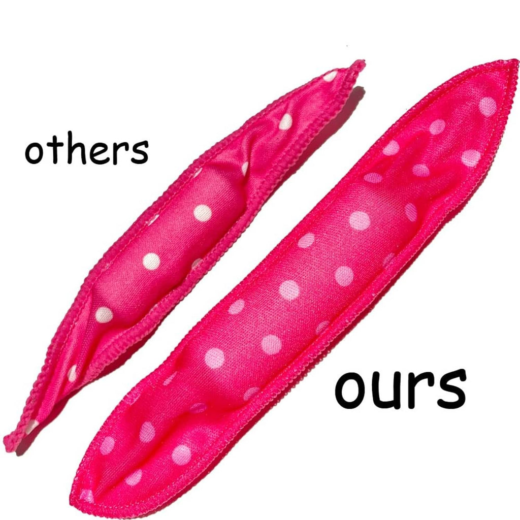 Pink polka-dot soft curlers with tapered ends for secure heatless styling