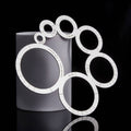 Leather corner cutting punch set with round templates and radius markings, white measuring rings