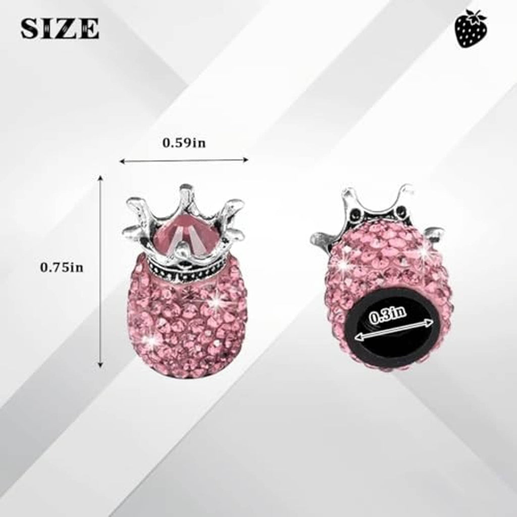 Two pink rhinestone crown valve stem caps with silver crown and black opening