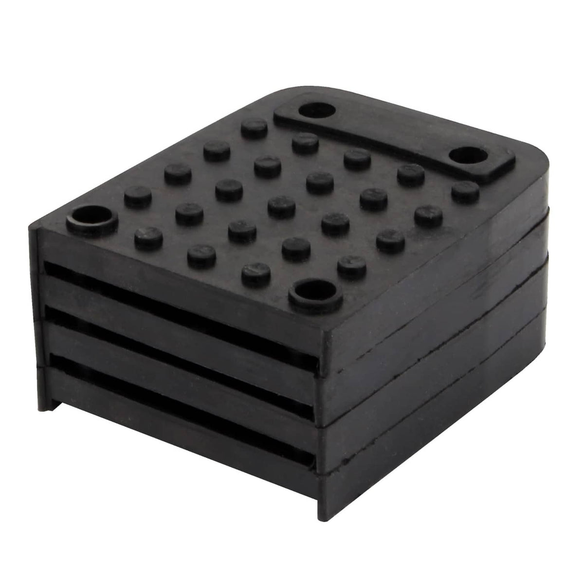 Close-up of a black rubber anti-slip stilt foot pad with raised grip dots