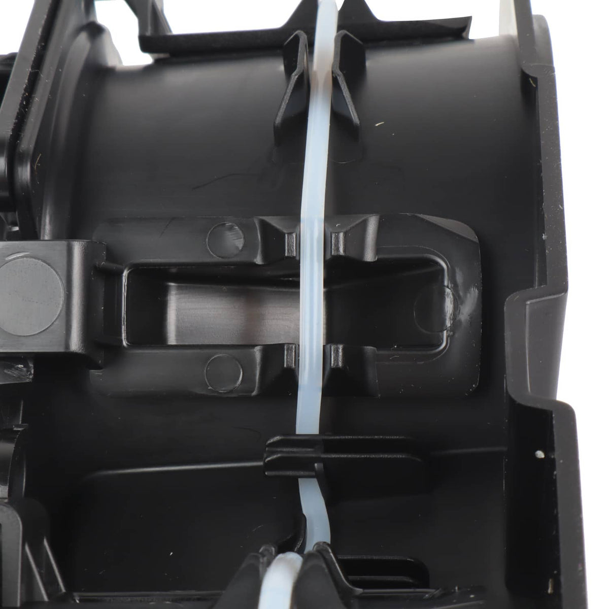 Center console cup holder insert with rectangular rim and molded recess, black plastic