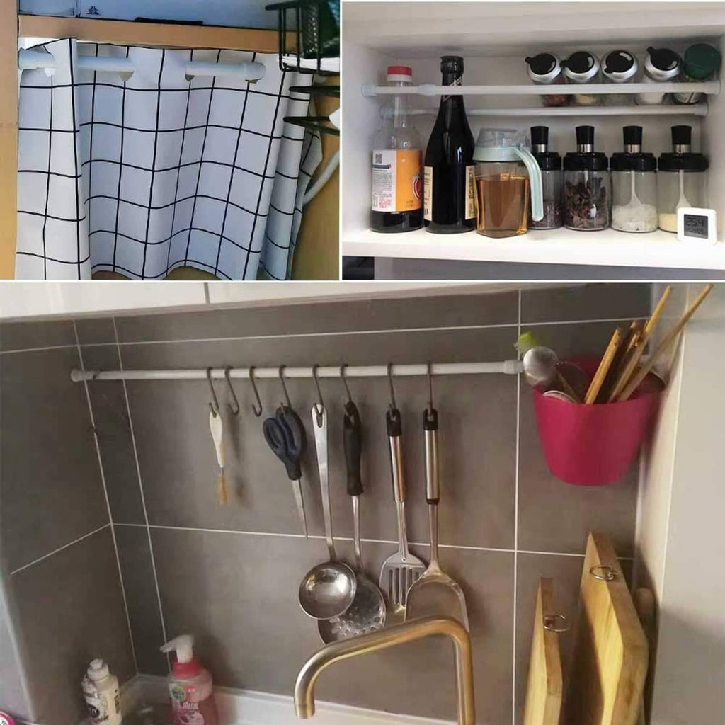 White tension curtain rod with hanging hooks holding kitchen tools