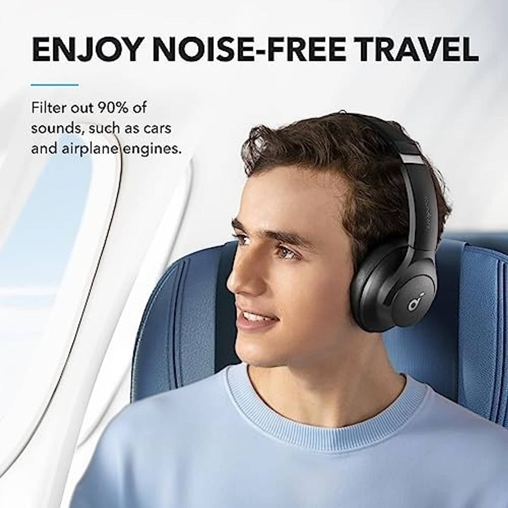 Black over-ear headphones worn by person, side view with padded ear cushions